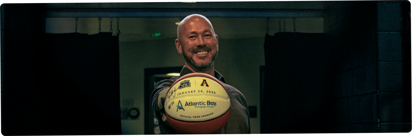 Kevin Cooke with an Atlantic Bay basketball